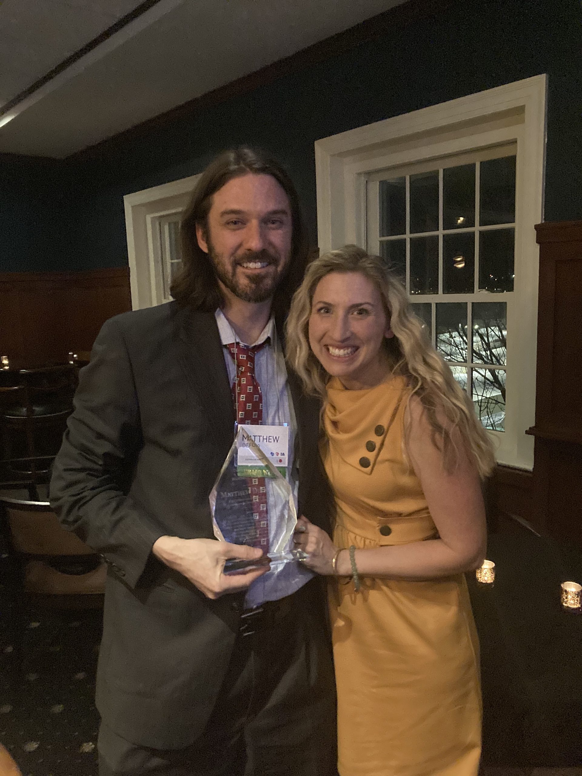 Matt DeFour with award.